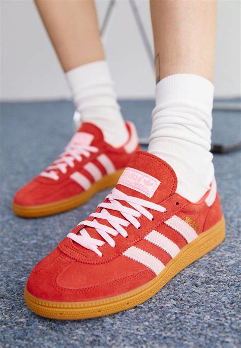 adidas handball.spezial pink|adidas originals handball spezial trainers in red and pink.